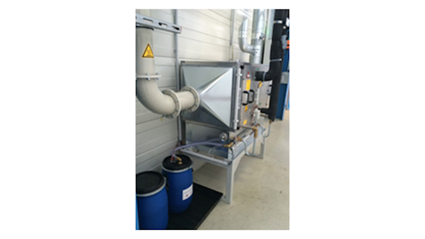 An extraction system is installed on the coating system, connected through ducts