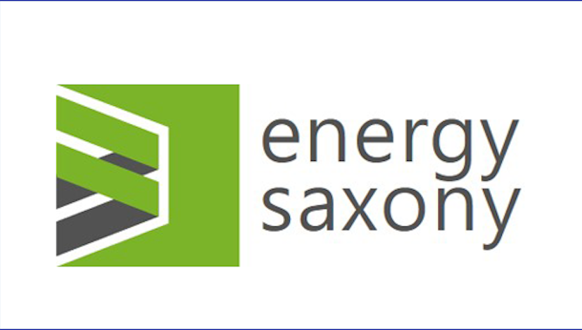 Green and black logo next to the association's lettering