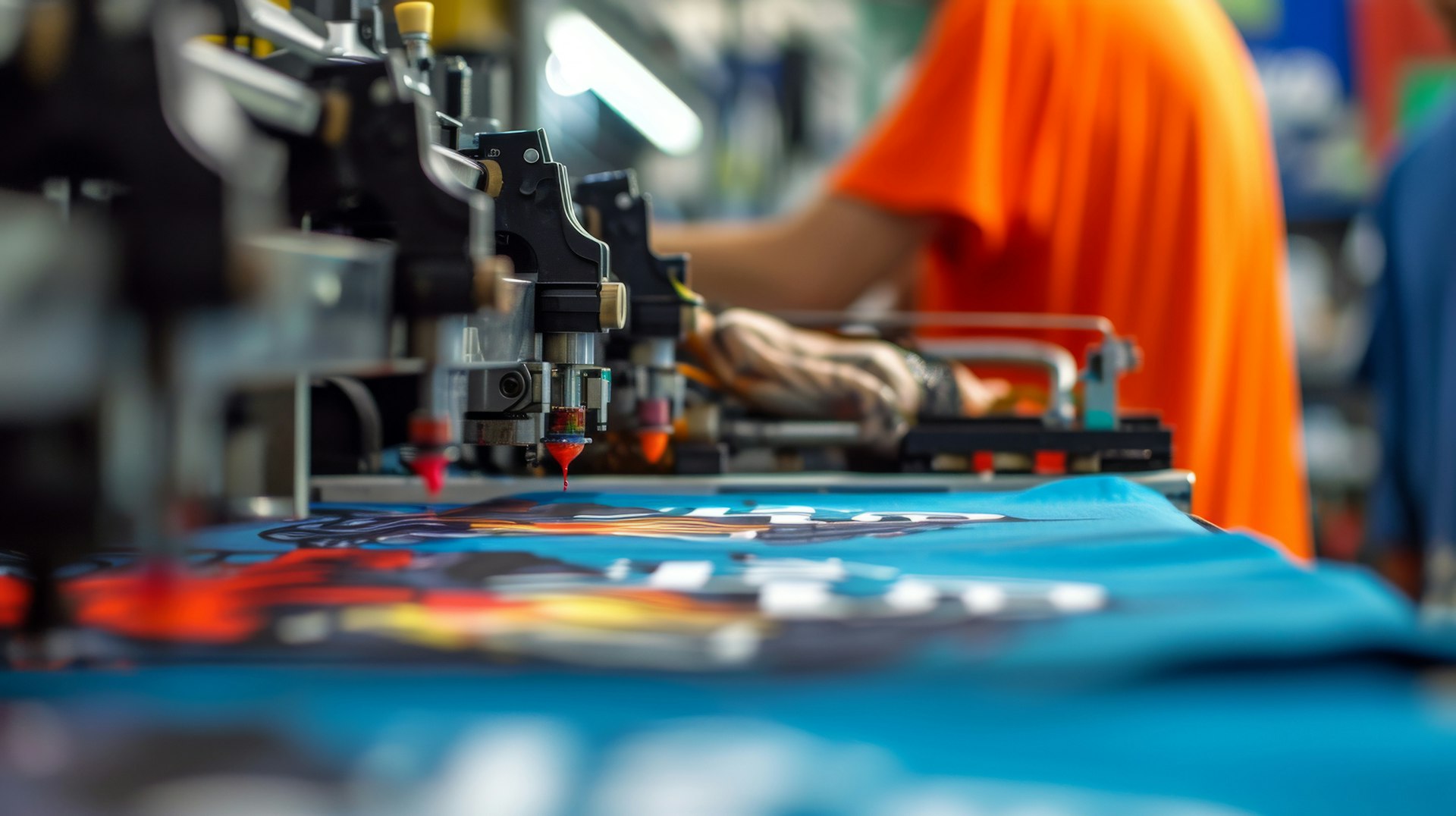 A printing machine prints textiles of different colors