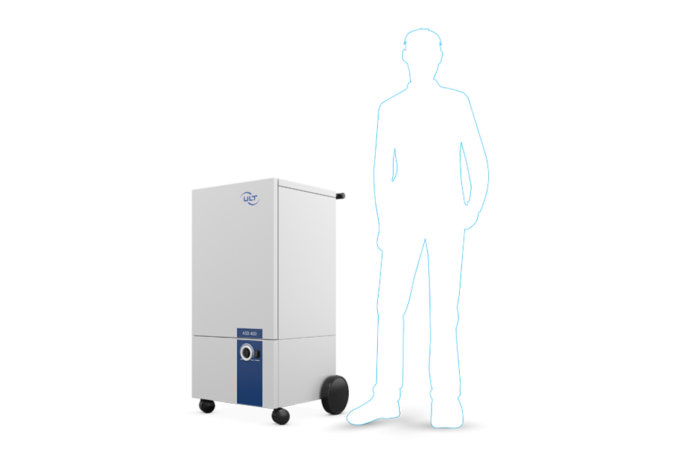 Person shown in silhouette next to the extraction system