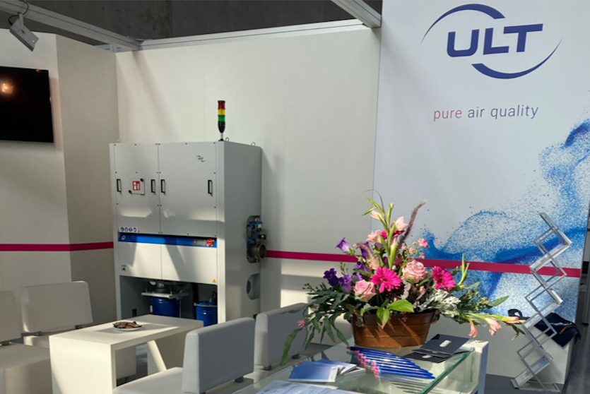 ULT booth with ventilation system and air quality slogan on the wall