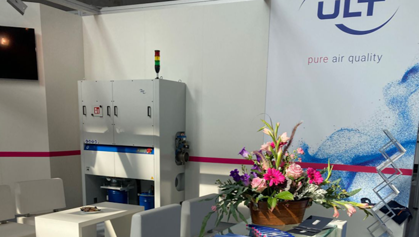 ULT booth with ventilation system and air quality slogan on the wall