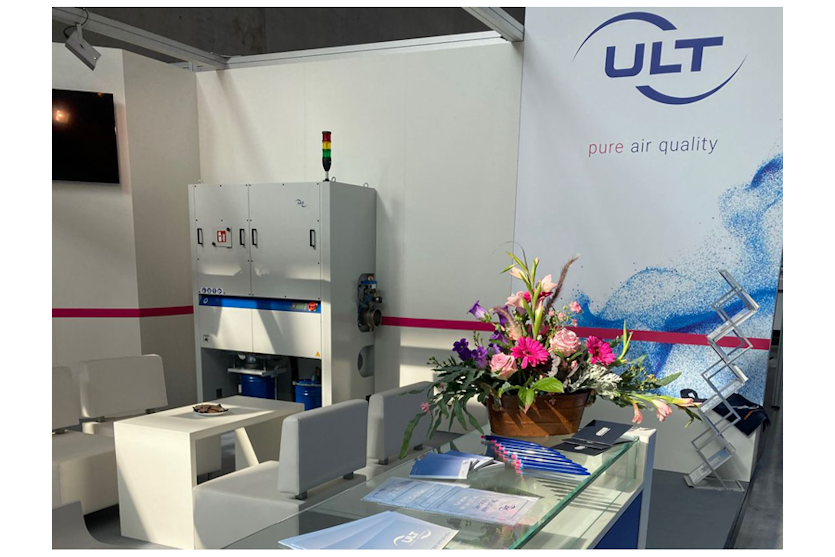 ULT booth with ventilation system and air quality slogan on the wall